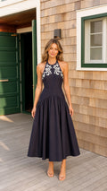 Navy blue halter neck embroidered drop waist midi dress front view