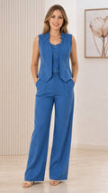 Front view of woman wearing blue sleeveless vest and wide leg pants set