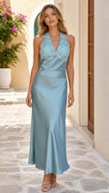 Front view of model wearing dusty blue floral lace halter satin maxi dress