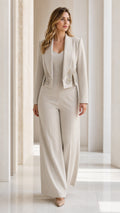 Front view of woman wearing champagne embellished cropped blazer and wide leg pant suit
