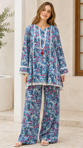 Model wearing blue floral tunic and wide-leg pants set front view
