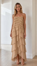 Model wearing beige tiered ruffle maxi dress from the front
