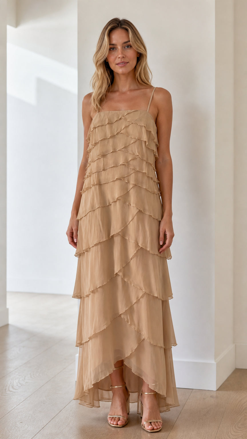 Model wearing beige tiered ruffle maxi dress from the front