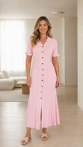 Model wearing pink ribbed knit polo midi dress, front view