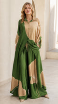 Front view of woman wearing green and beige two-piece shirt and wide-leg pants set