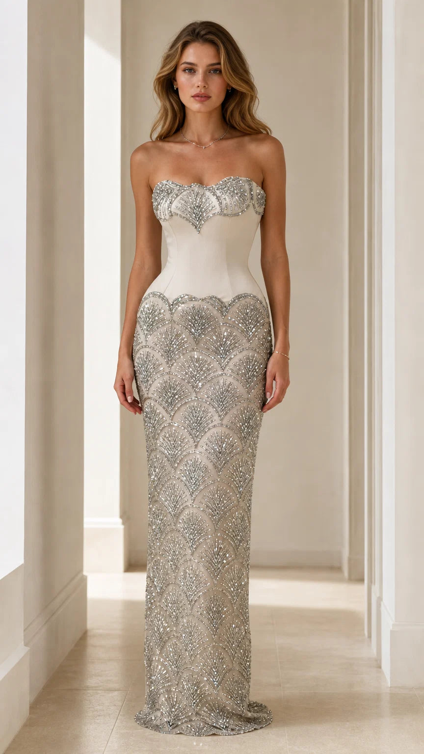 Front view of champagne sequin strapless evening gown