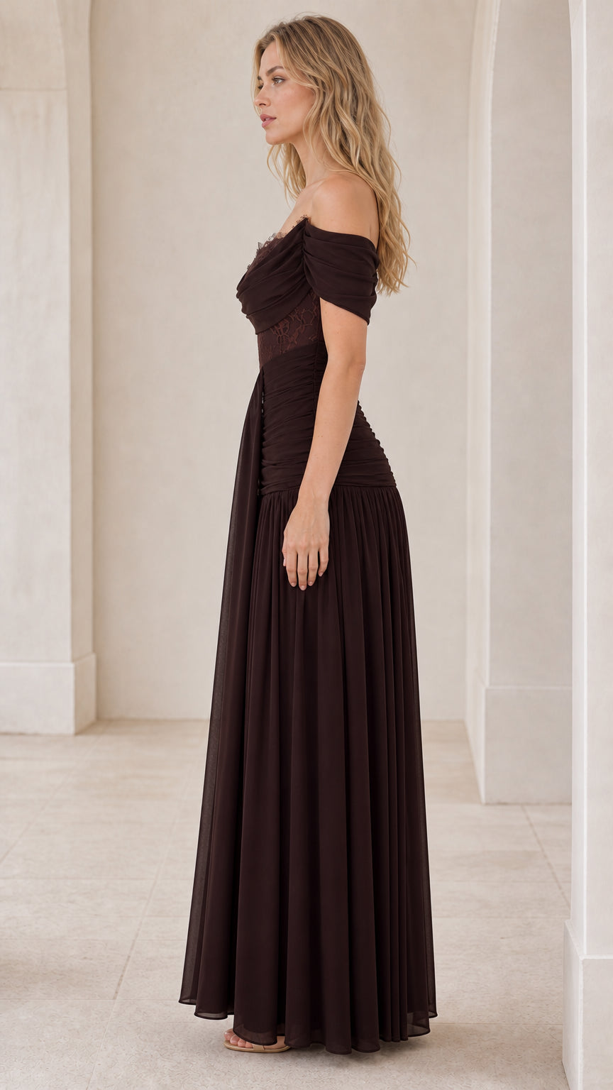 Side profile view of brown evening dress