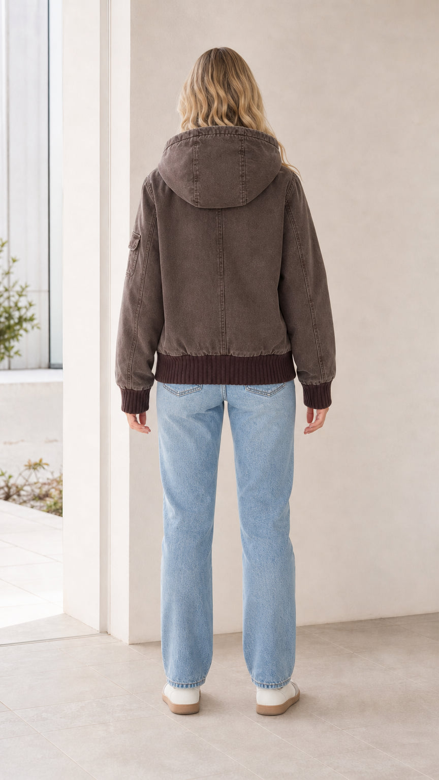 Back view of the brown canvas hooded bomber jacket