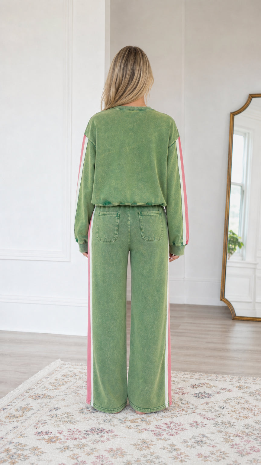 Back view of model wearing the Sage Green wide-leg lounge pants and pullover sweatshirt set