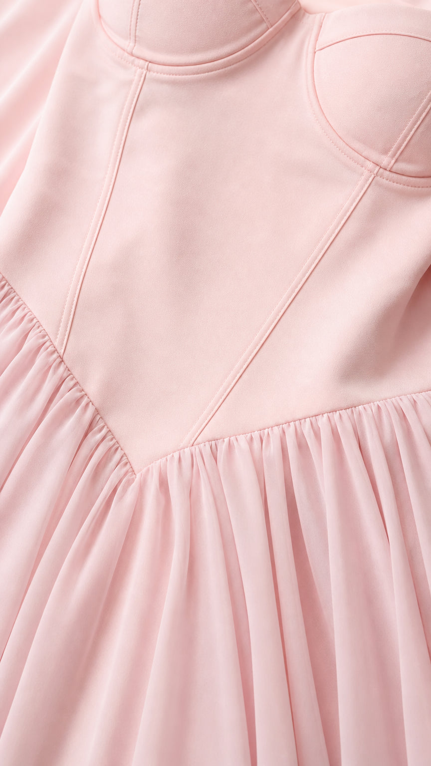 Close-up detail of structured bustier bodice and V-waistline