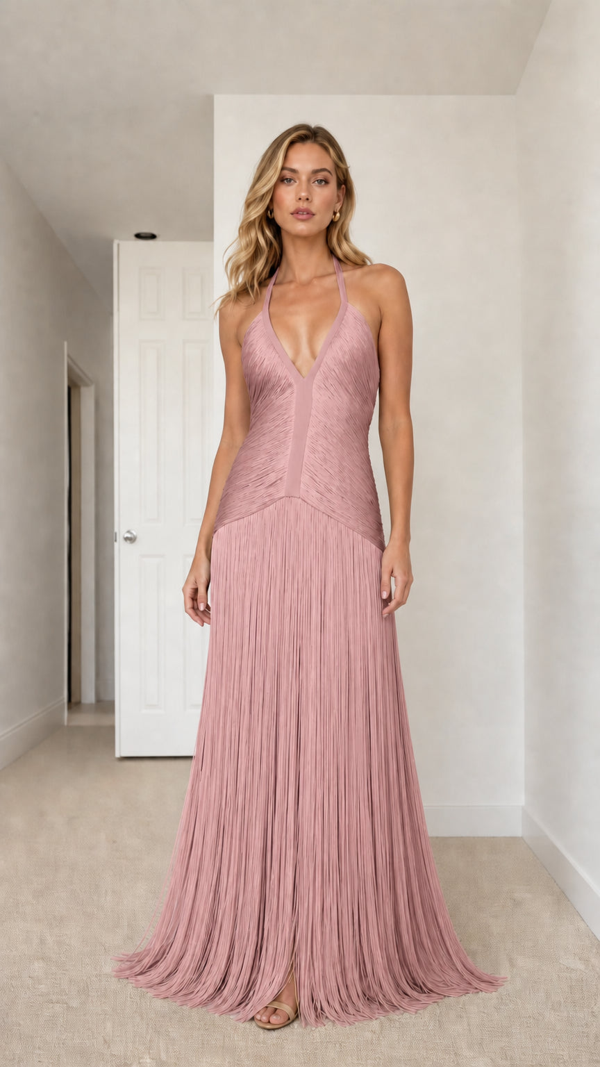 Model wearing blush pink deep plunge halter fringe maxi dress