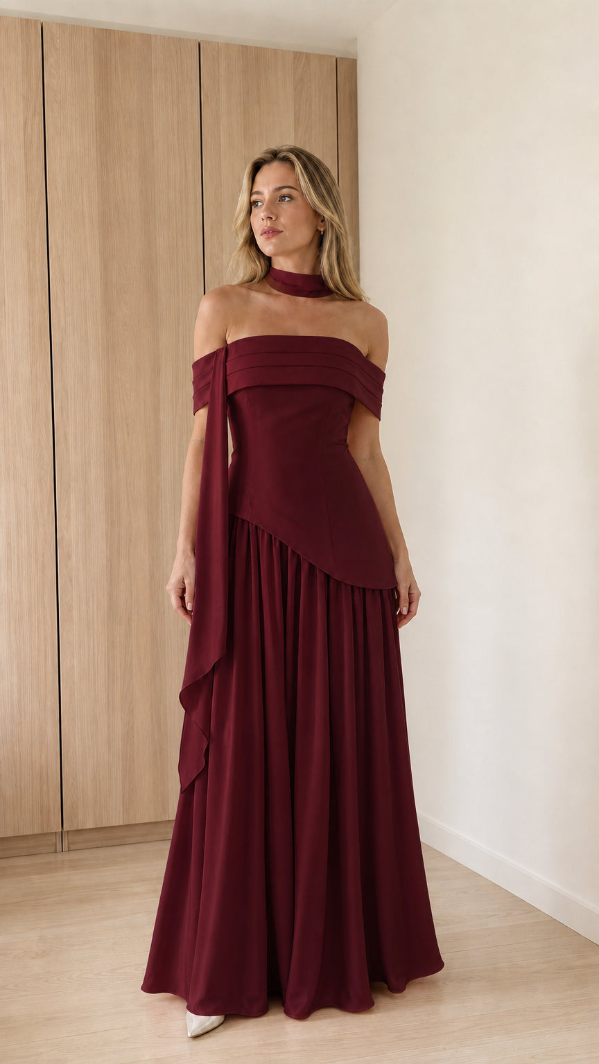 Model wearing burgundy off-the-shoulder maxi dress