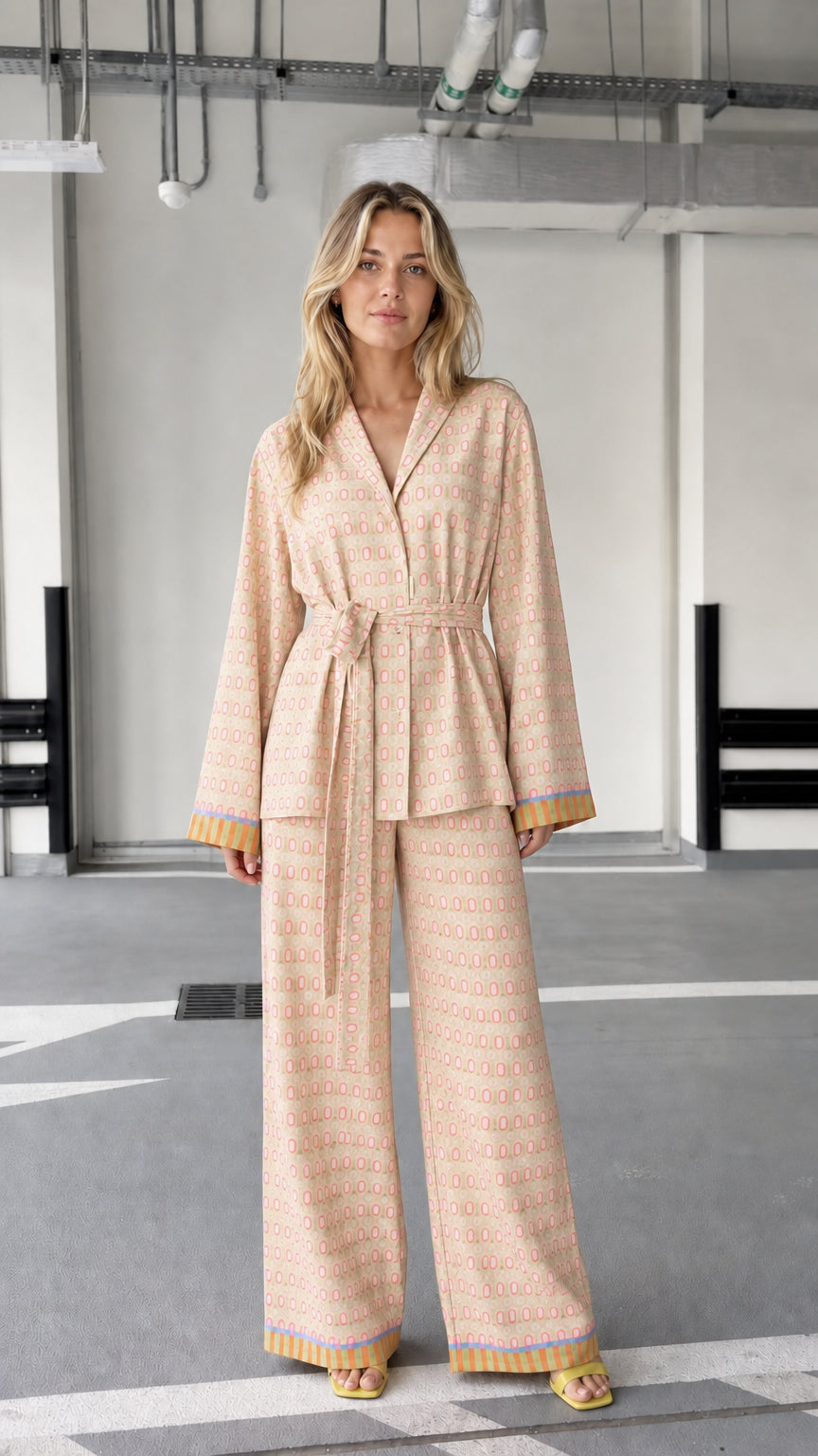 Woman wearing beige patterned two-piece lounge set